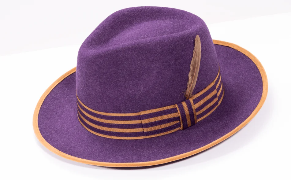 Montique H-102 Grape wide brim fedora with multi-striped grosgrain band and feather accent